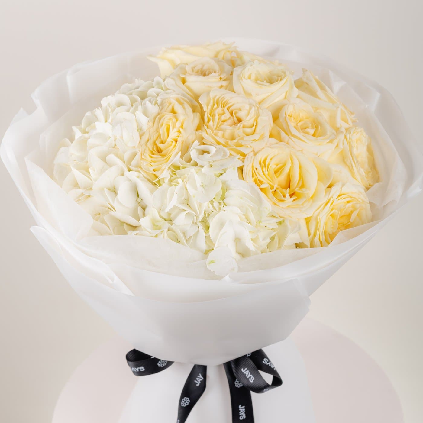 White & Peach Charm Floral Bouquet
